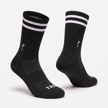 Create a ghost mannequin version of this crew sock.  Reference 2 is the pose we'd like to match. Place on a clean #f2f2f2 background.